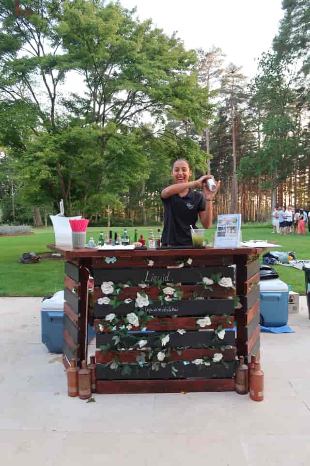 Branded portable bar at a Sunset Garden corporate mixer event.