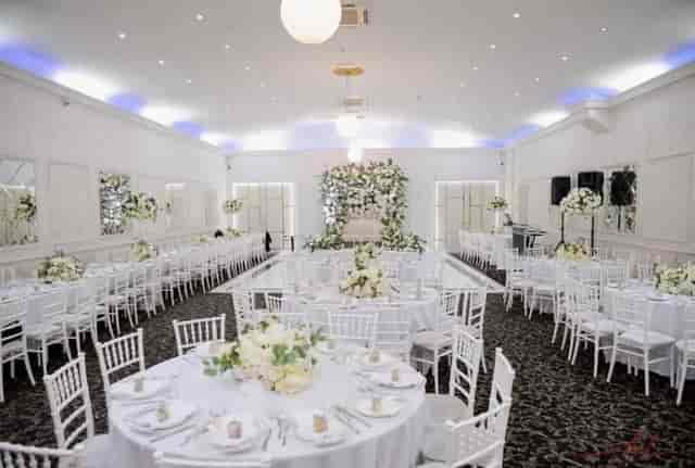 Crystal Suite at Kervan Banqueting: Elegant white floral wedding and gala banquet setup.