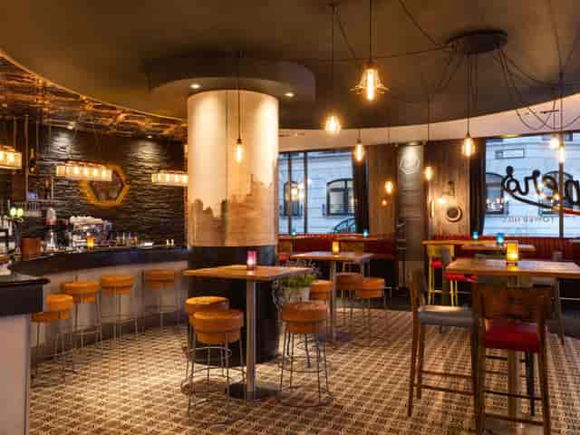 Barbican Suite breakout space with high-top seating for corporate events and conferences.