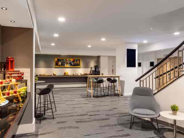 Barbican Suite break-out space with lounge seating for corporate meetings and networking events.