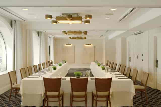 U-shaped boardroom set-up at The Corner Room, The Benjamin Royal Sonesta for corporate meetings.