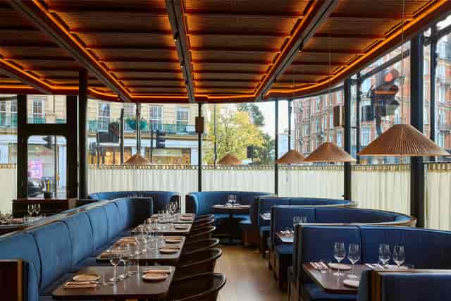 Contemporary restaurant venue at The Barbary Notting Hill with curved banquette for corporate events.