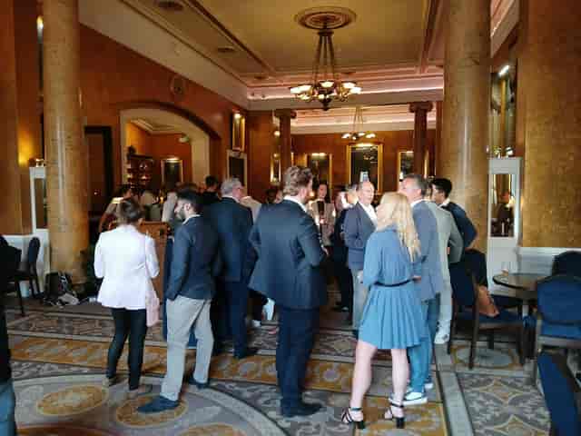 High-end corporate networking reception at RnR Lounge, upscale industry mixer event.
