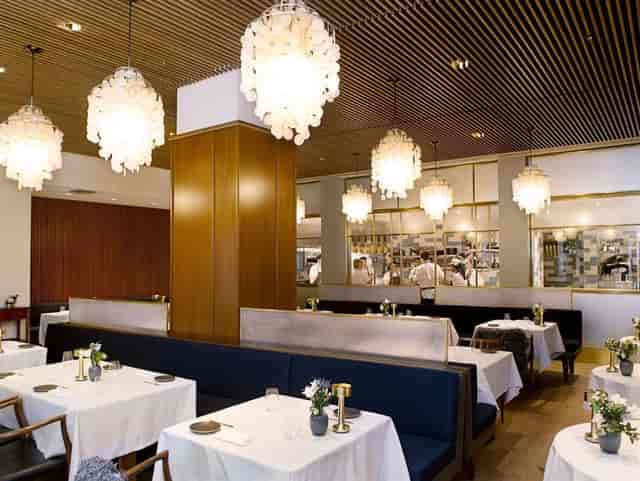 Modern Aquavit restaurant interior for executive dinners and private business events.