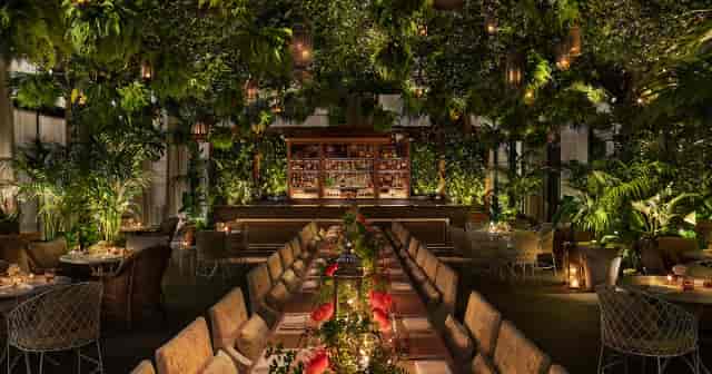 Lush biophilic canopy at The Times Square EDITION for a luxury gala or private dinner event.