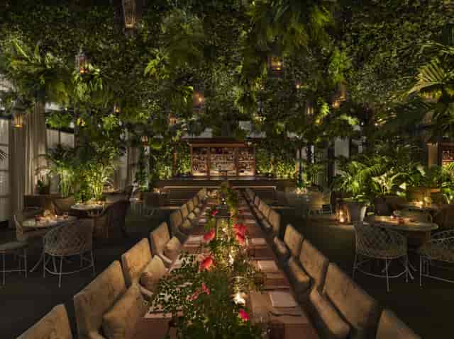 Biophilic banquet event space at The Times Square EDITION for exclusive dinners and networking.