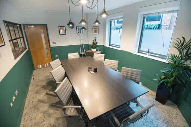 Modern 8-person boardroom at Flexico Workspace for professional meetings and collaboration.