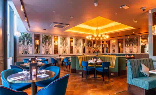 Semi-private dining at Browns Victoria with plush booths for corporate dinners and VIP events.