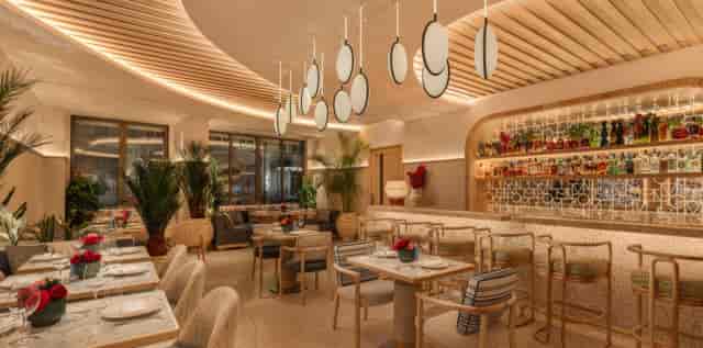 Nammos London restaurant with tiered seating for VIP dinners and corporate networking events.