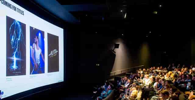 Corporate product reveal at Curzon Chelsea with large-format screen theater setup.