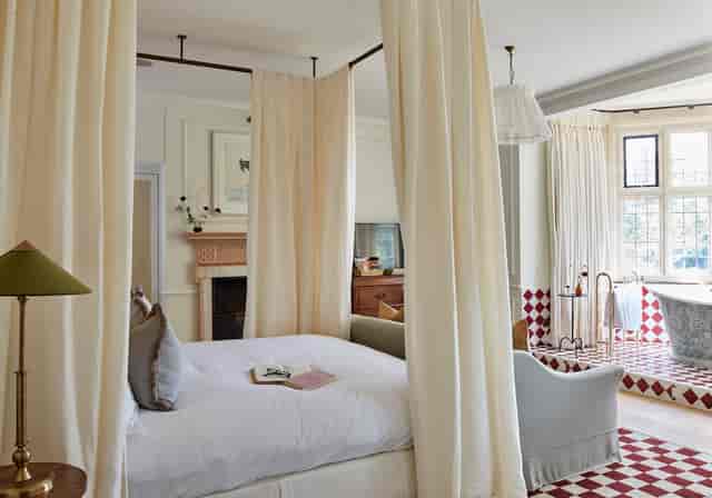 Luxury hotel suite with elegant drapery for VIP executive stays or bespoke bridal accommodation.