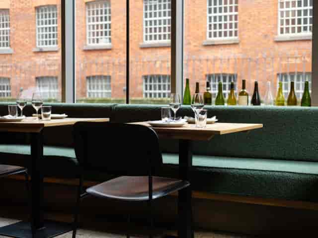 Private party room in Slug & Lettuce Deansgate with banquet seating for corporate networking events.