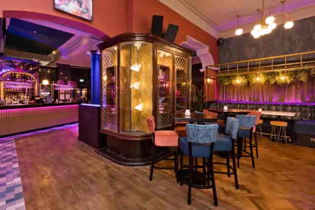 Reserved area at Slug & Lettuce Deansgate with high-top seating for networking and mixer events.