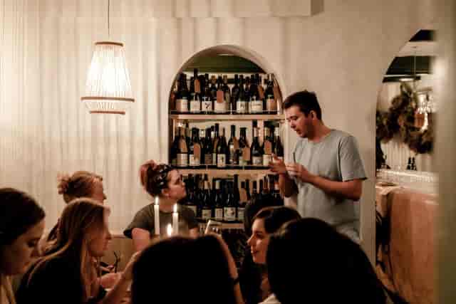 KASK Wine Bar corporate breakout session in intimate cellar setting for networking events.