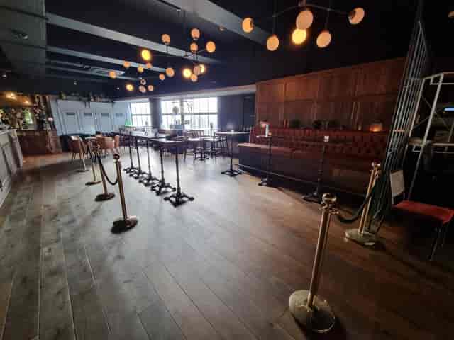 The Lounge at The Lost & Found: cocktail reception space with high-top tables for event venue hire.