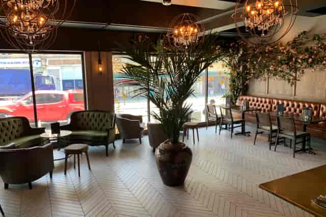 Upscale hybrid lounge with conversational seating for networking and VIP corporate events.