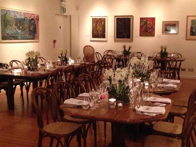Elegant dining space with floral centerpieces for corporate dinners and gatherings.