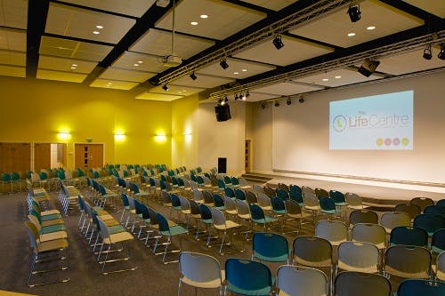 Wesley Hall auditorium with tiered seating for conferences and workshops.