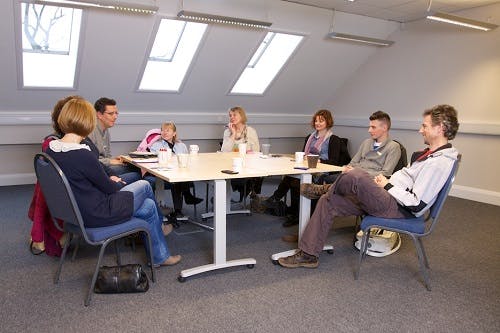 Graham Room at The LifeCentre: modern meeting space with round table for brainstorming sessions.