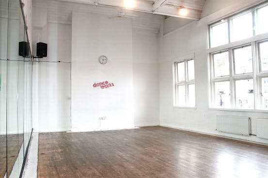 Versatile Danceworks Studio 3 with polished wooden floor, ideal for workshops and classes.