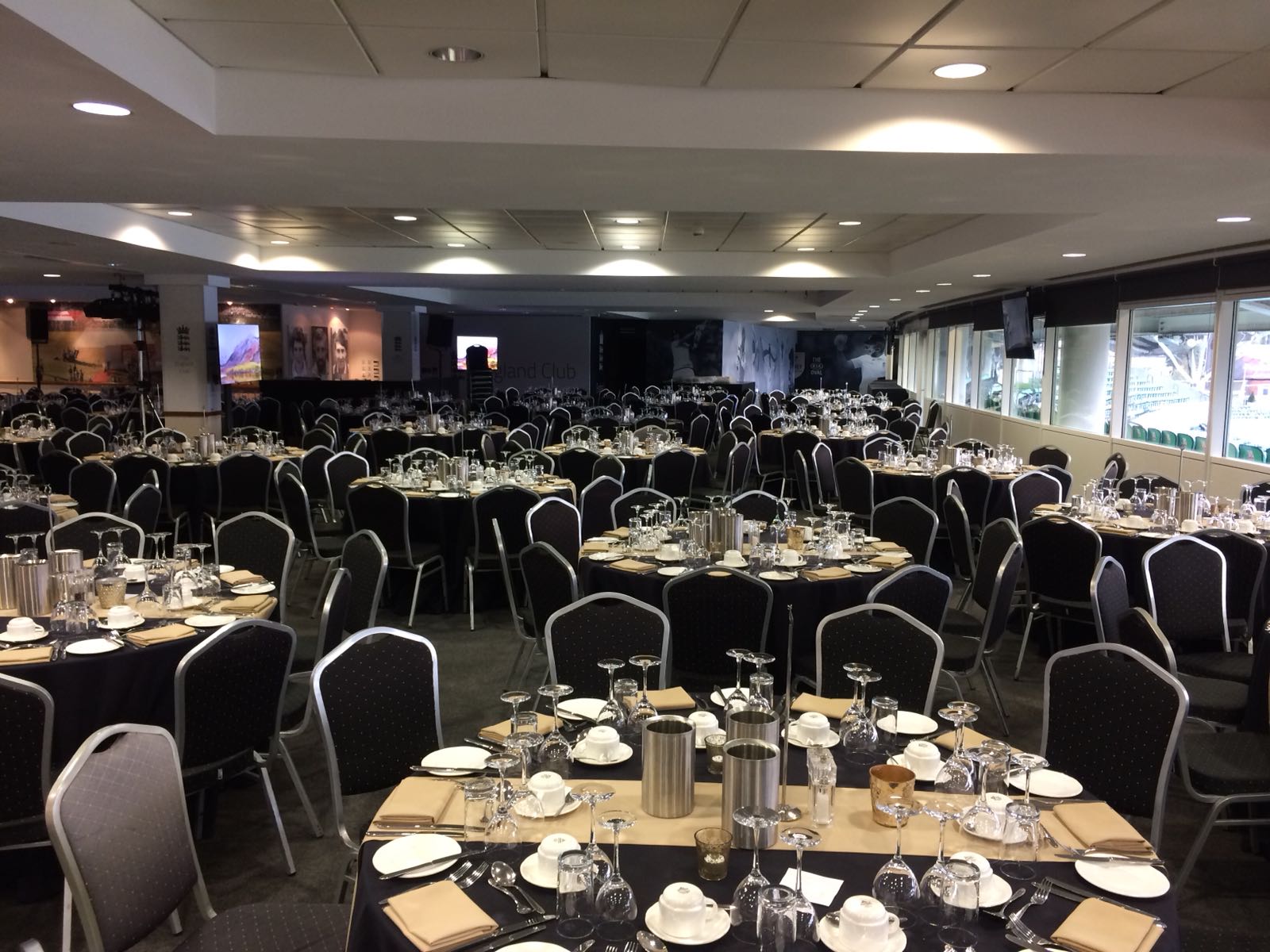 Elegant banquet setup in England Room, Kia Oval for conferences and formal dinners. - Banner