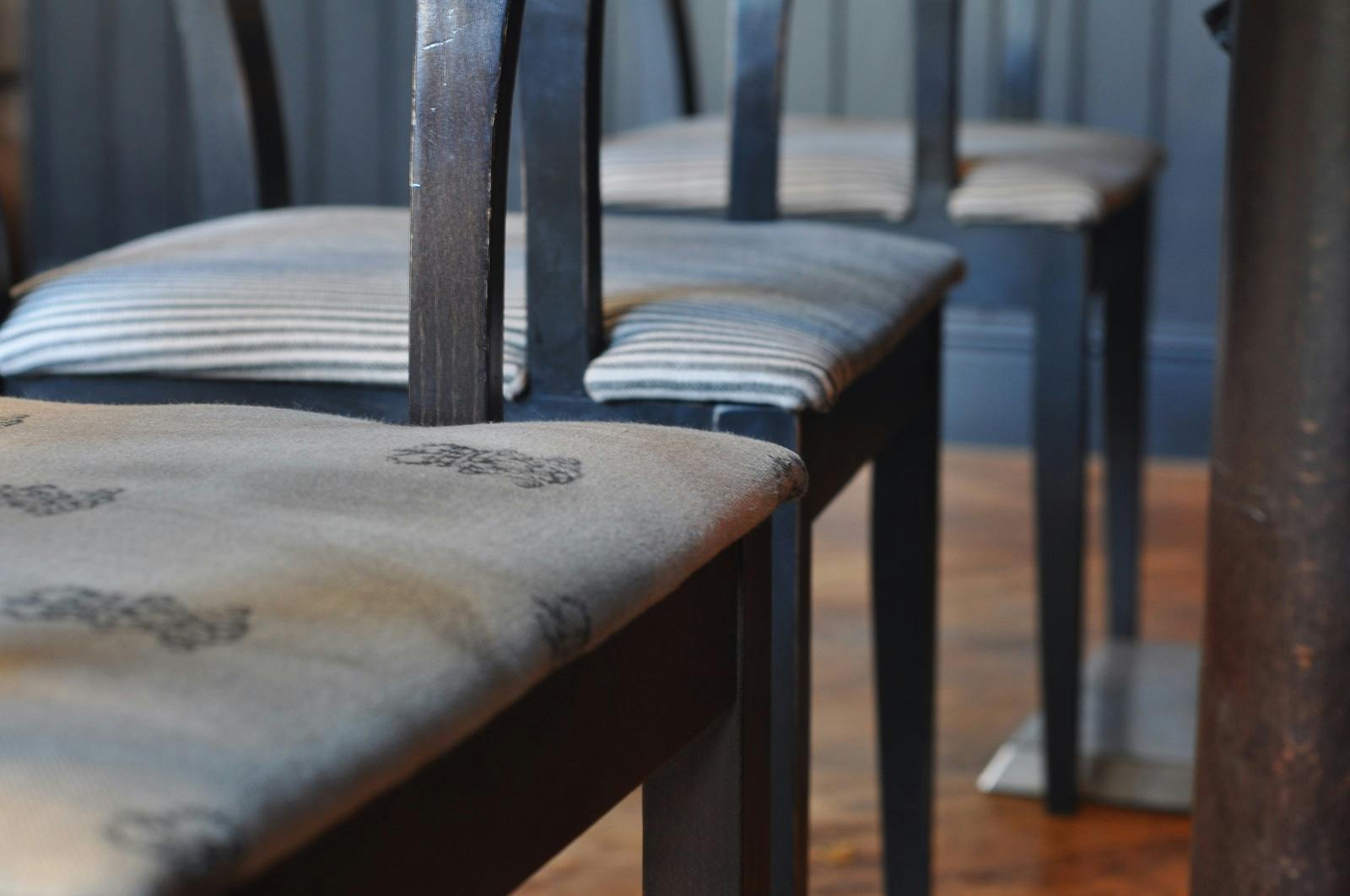 Elegant chairs at Magpie Bar, perfect for intimate meetings and events.