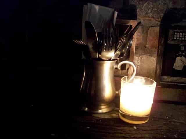 Rustic Magpie Bar with vintage utensil holder, ideal for intimate networking events.