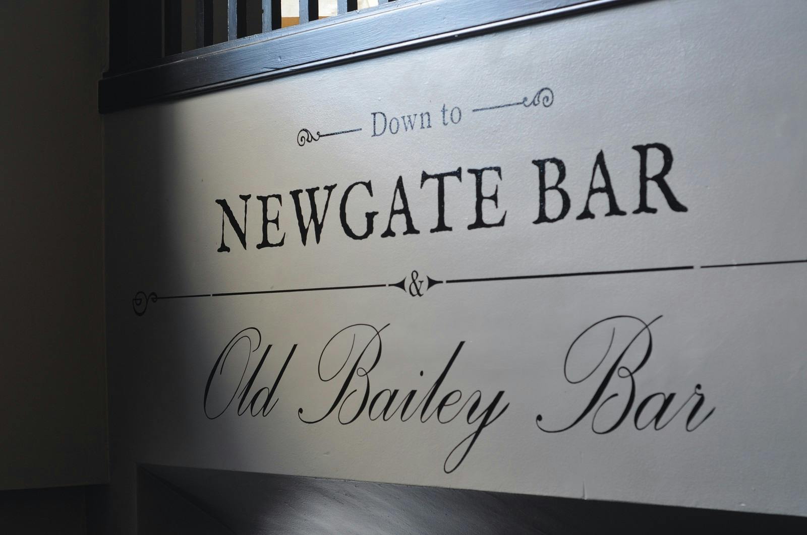 Stylish sign at Old Bailey Bar, ideal for networking events and social gatherings.