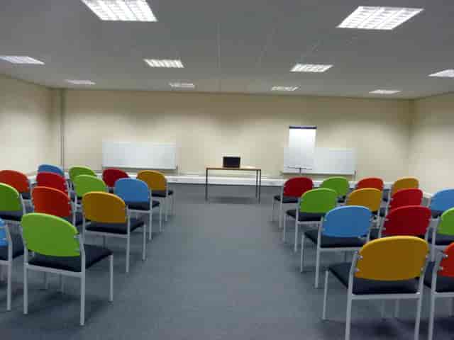 Training Room 2 at Redbank House, featuring colorful chairs for workshops and presentations.