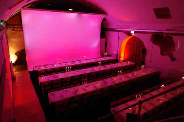 Whole Venue at Canvas Works, elegant long tables for intimate dinner or presentation events.
