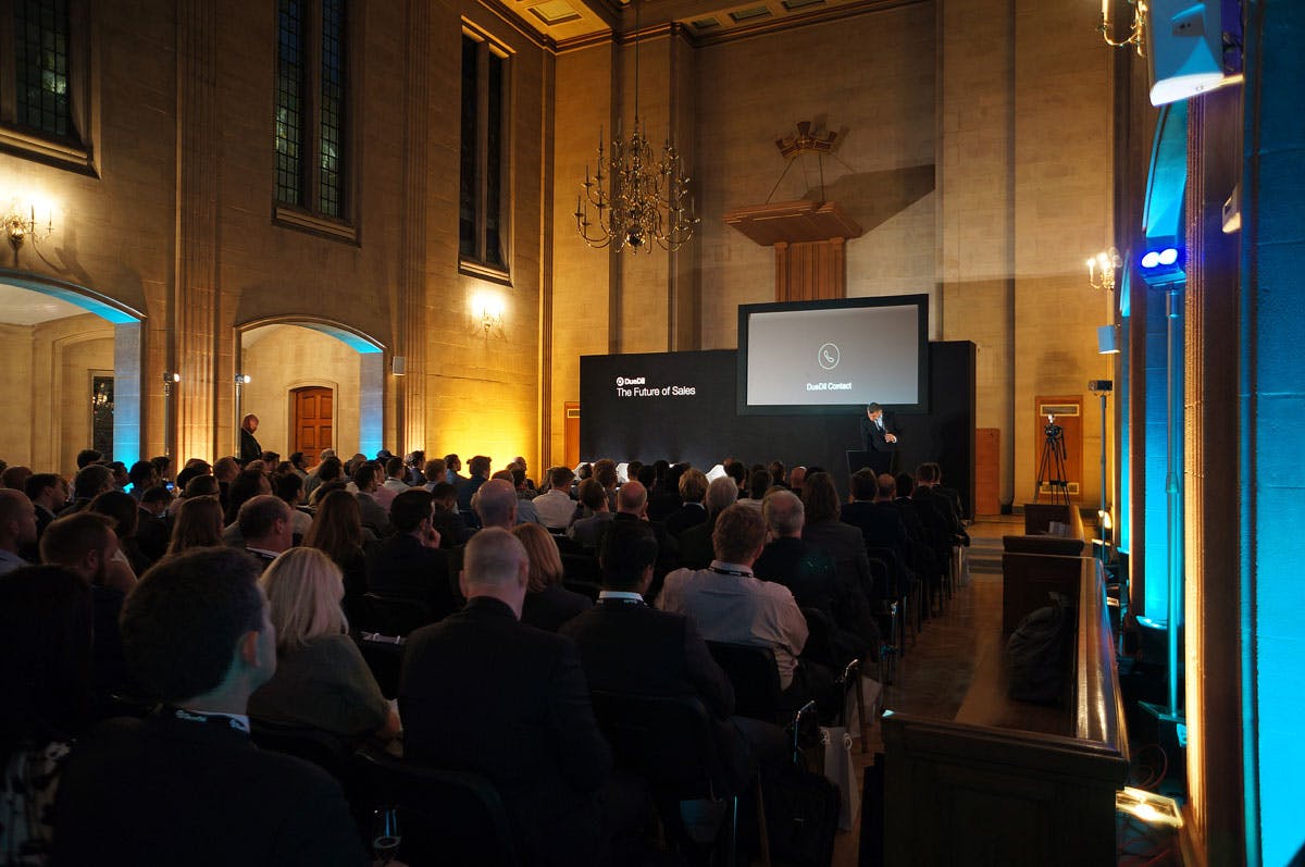 Whole Venue at The Dutch Hall during a professional conference with engaging speaker and visuals.