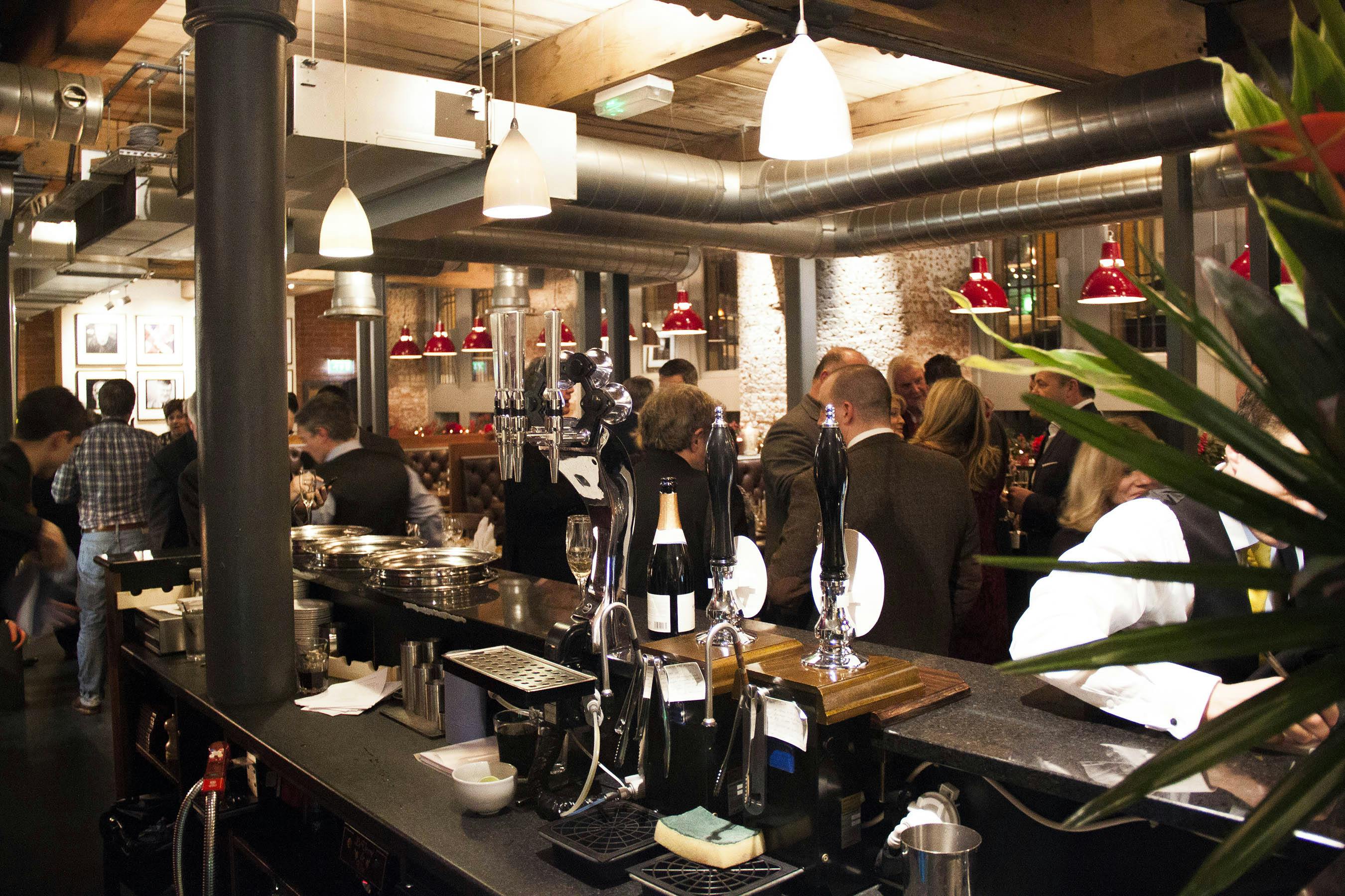 Vibrant restaurant venue with modern decor, ideal for networking events and social gatherings.