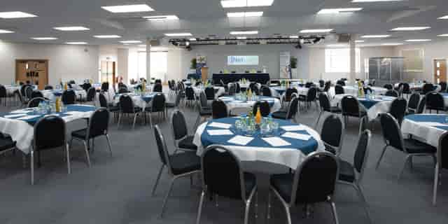 King's House Conference Centre auditorium set for a professional conference or banquet.