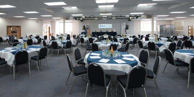 King's House Conference Centre auditorium set for a professional conference or banquet.