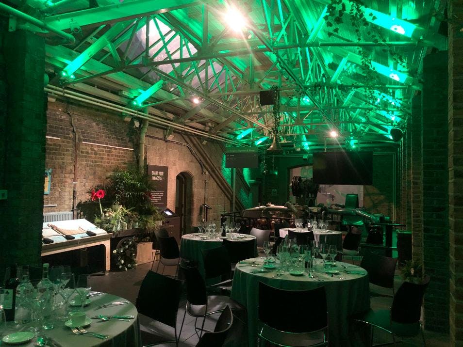 Engine Rooms Tower Bridge: industrial event space with dining setup, ideal for corporate events.