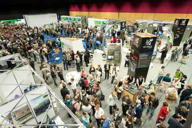 Lennox Suite trade show in Edinburgh, showcasing vibrant networking and exhibitor booths.