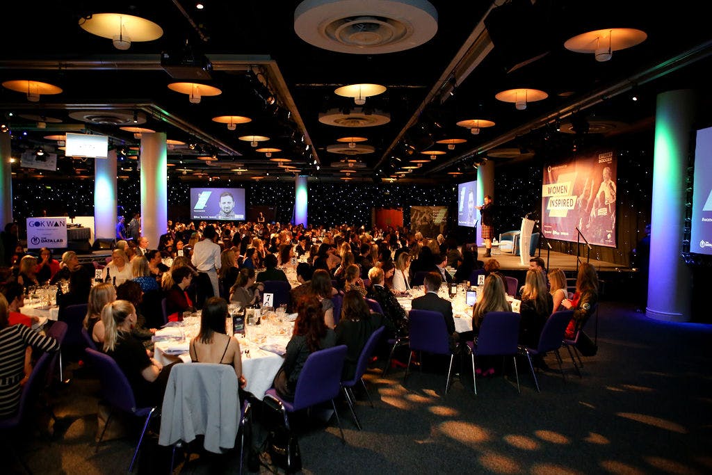 Cromdale Hall gala event with elegant tables and vibrant atmosphere in Edinburgh.