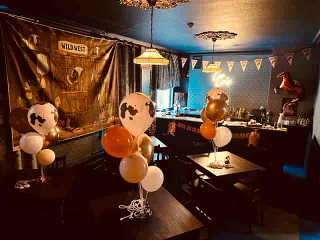 Wild West themed Kings Arms Theatre event space with rustic decor for parties and gatherings.