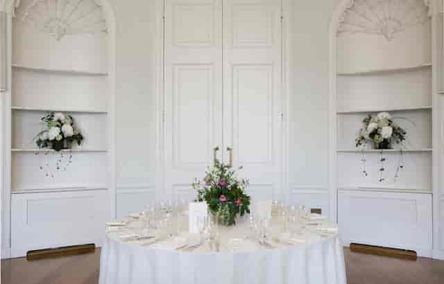 Elegant round table setup in Fine Room 2, Asia House for formal dinners and events.