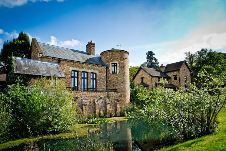 The Tower House at Coworth Park: charming venue by water for events and meetings.