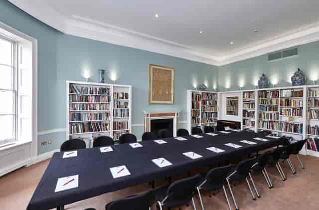 Library meeting room in Asia House, featuring a long table for professional gatherings.