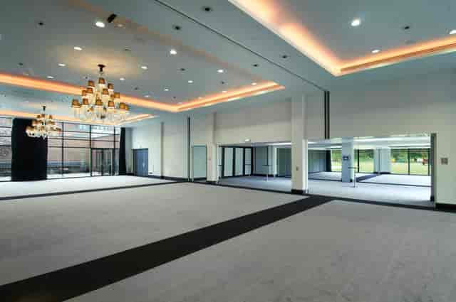 Grand Syon Ballroom with elegant chandeliers, ideal for conferences and banquets.