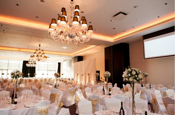 Grand Syon Ballroom with chandeliers, ideal for weddings and formal events.