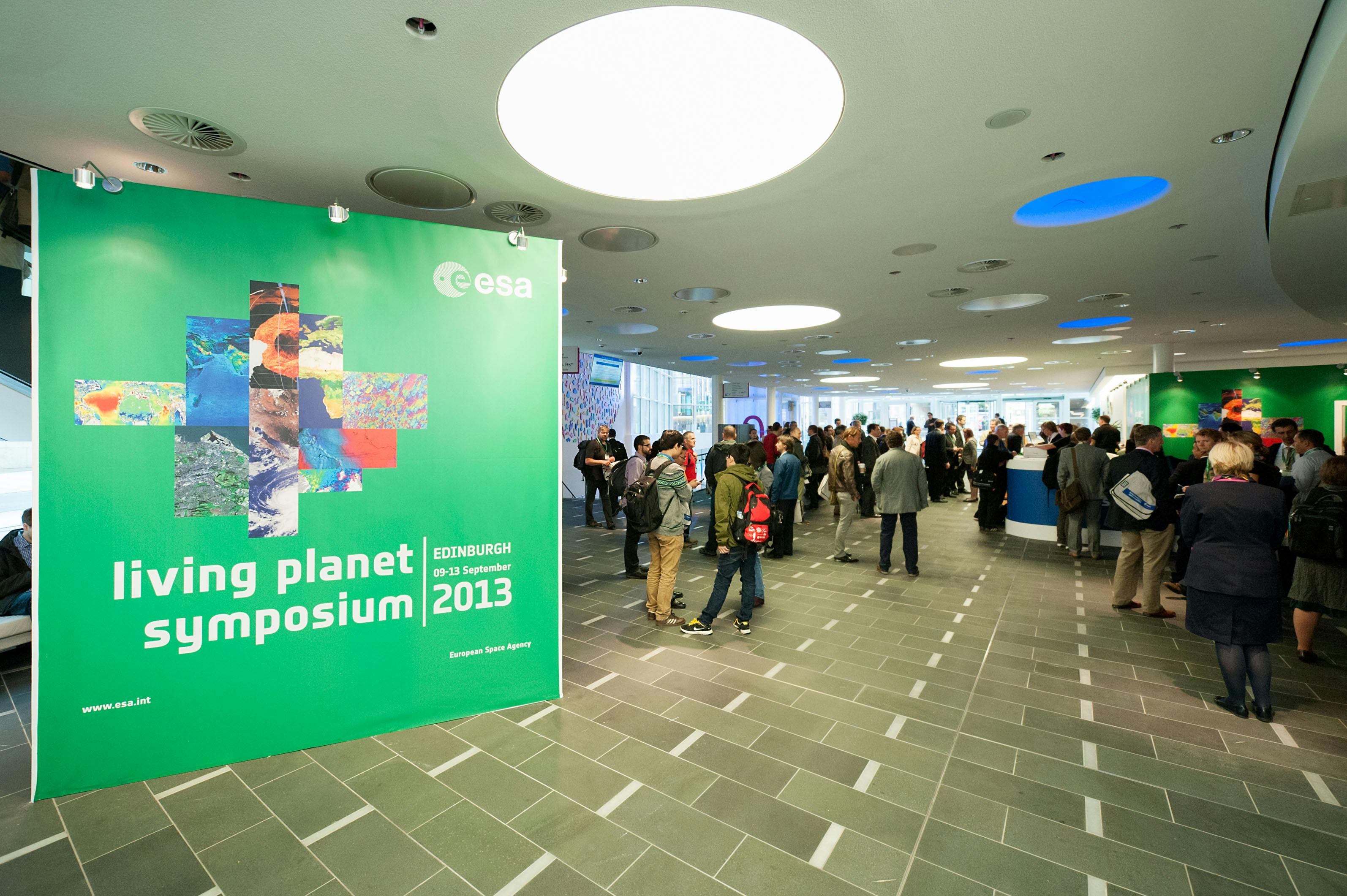 Atrium at Edinburgh Conference Centre during Living Planet Symposium 2013, vibrant networking space.