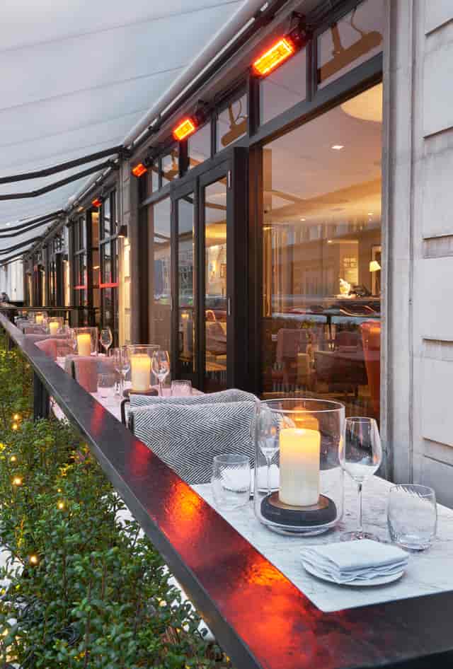 Elegant outdoor dining area at Sartoria, perfect for upscale events and intimate gatherings.