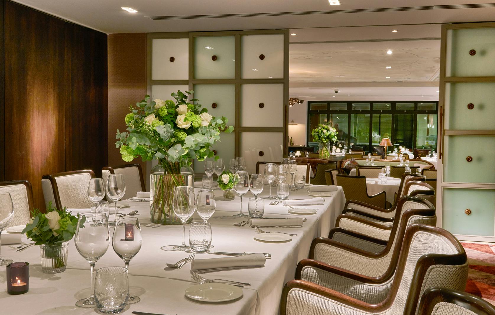 Elegant dining room at Sartoria, perfect for corporate dinners and upscale events.