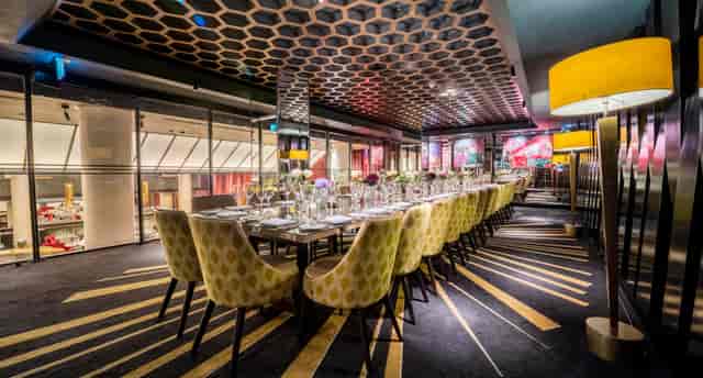 Prince of Wales Room at Quaglino's with hexagonal ceiling, ideal for upscale events and meetings.