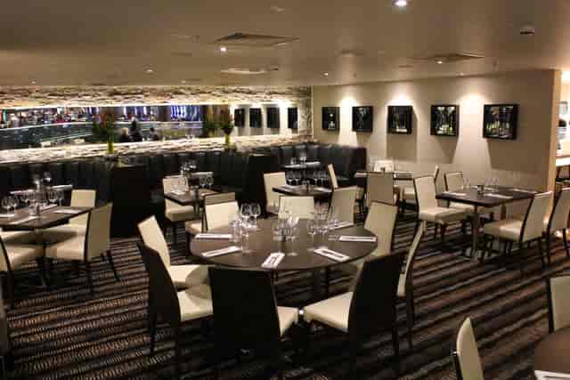 Elegant dining space at Fahrenheit Restaurant, perfect for corporate events and private gatherings.