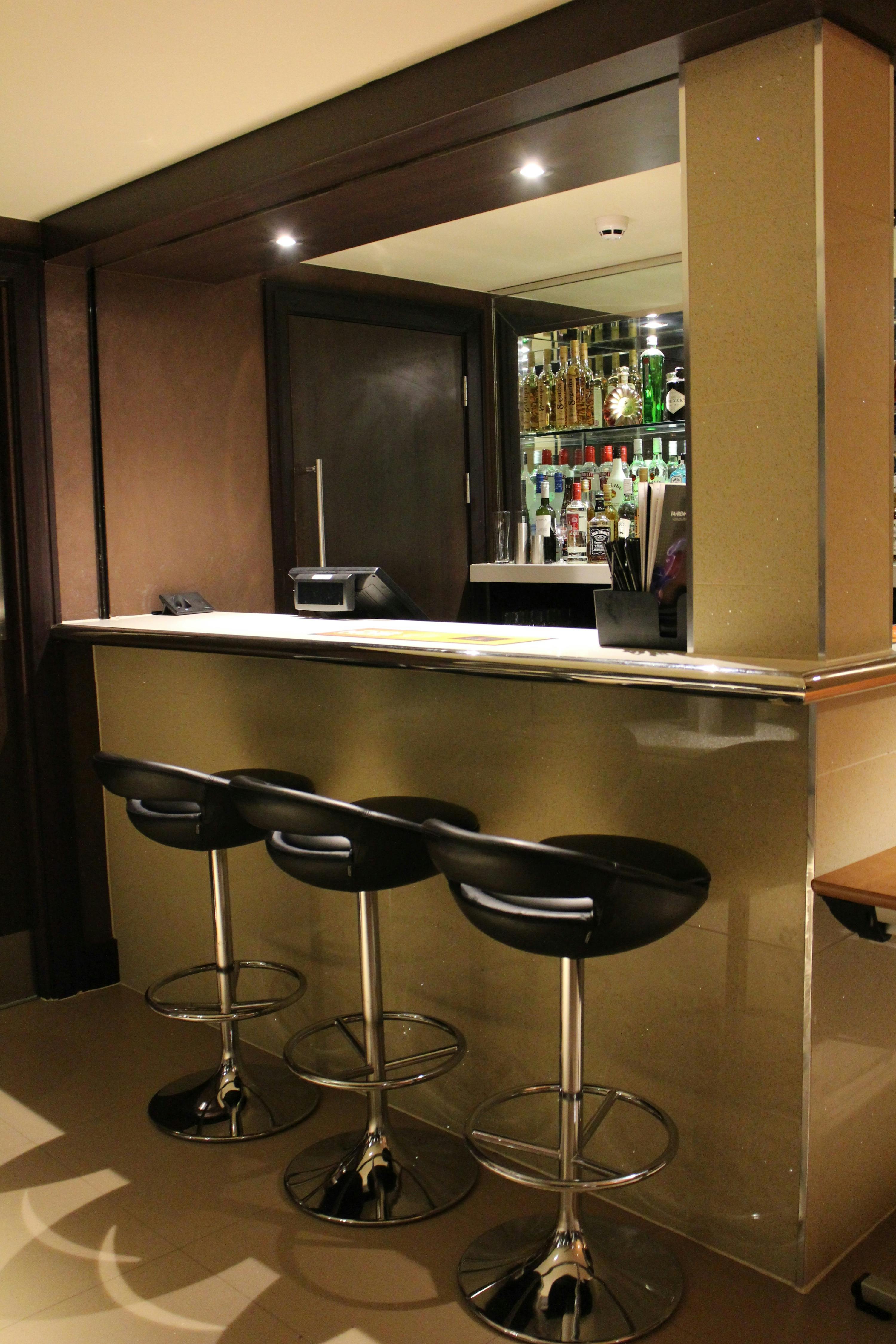 Sleek bar at Balcony Bar, Genting Club Manchester for networking events and cocktail receptions.