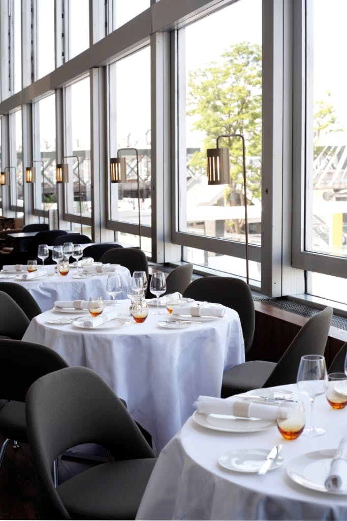 Sophisticated dining setup in Skylon venue for corporate events and private gatherings.